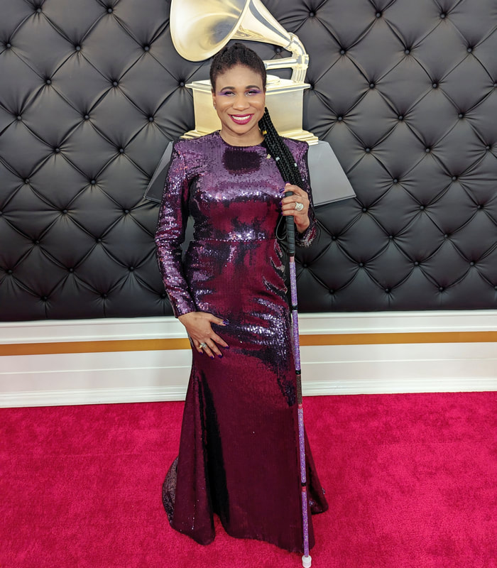 Lachi in a purple sequin alex perry gown dress at the grammys. black blind woman. disabled celebrity, celebrity with a disability