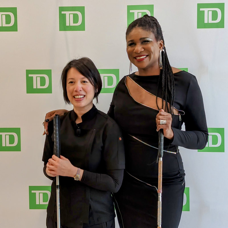 Lahci and Christine Ha at TD Bank, blind women