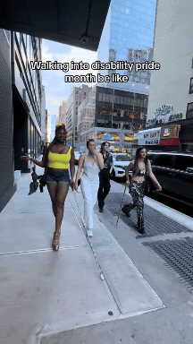 Lachi struts with other disabled women
